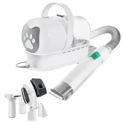 Pet grooming tool set with various attachments on a white background
