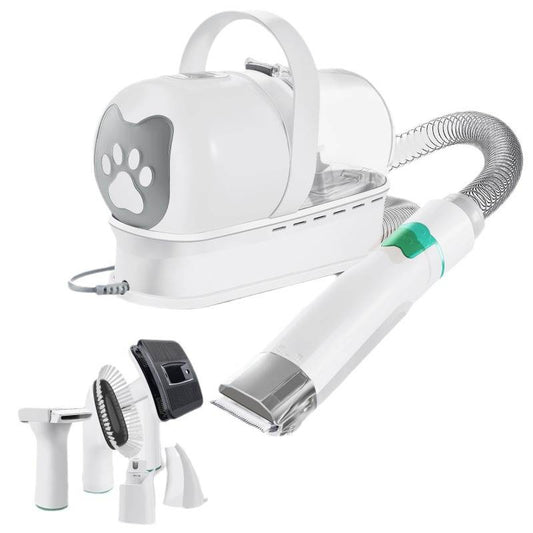 Pet grooming tool set with various attachments on a white background